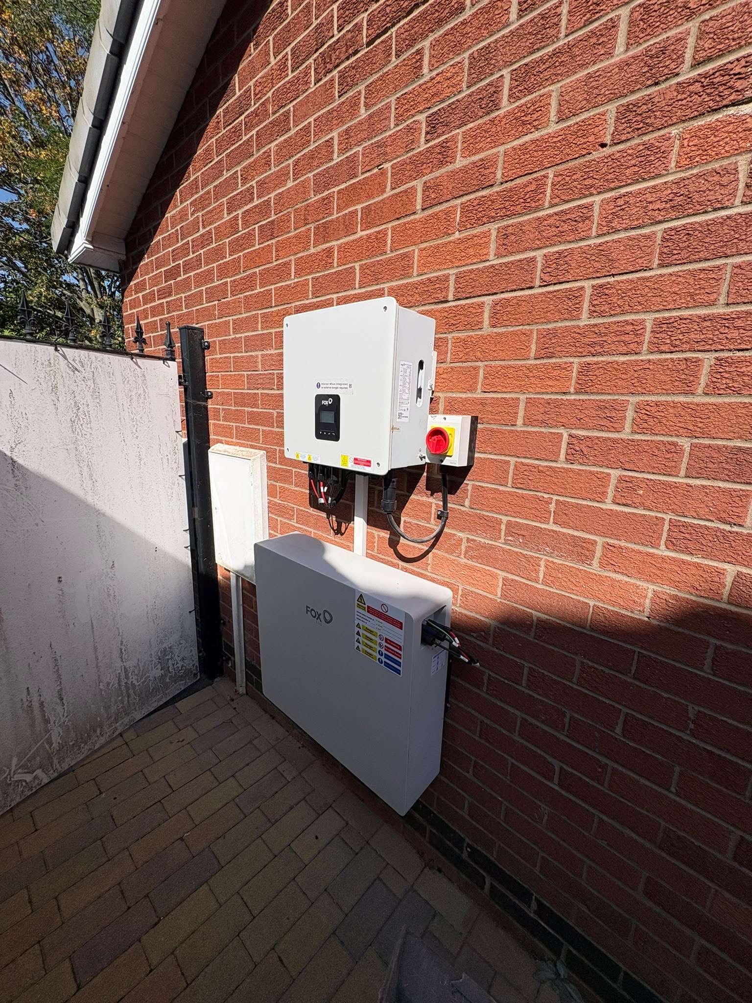 FOX ESS home battery installed on an external wall